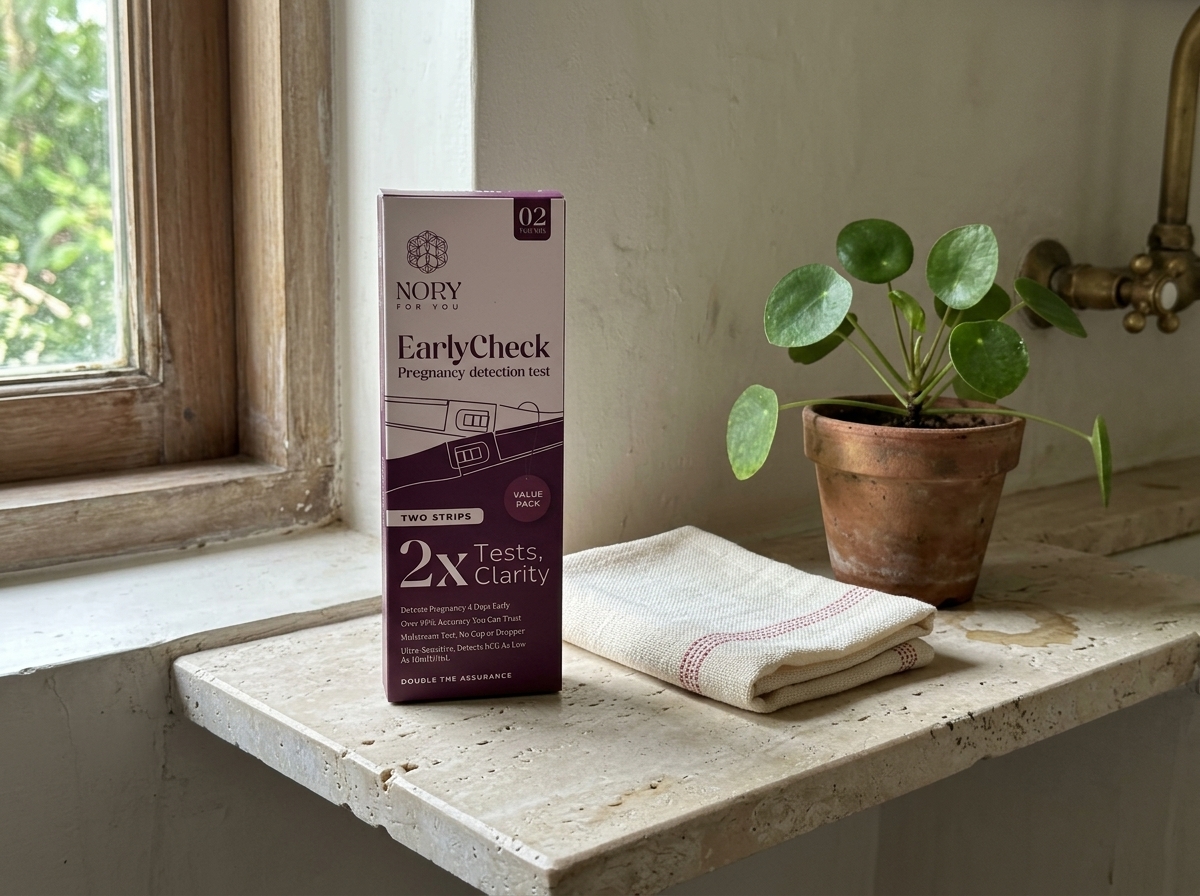 An early detection pregnancy test kit showing a positive result.